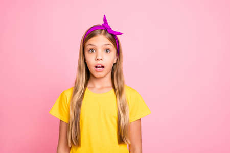 Photo of terrified girl seeing something negatively special while isolated with pink background