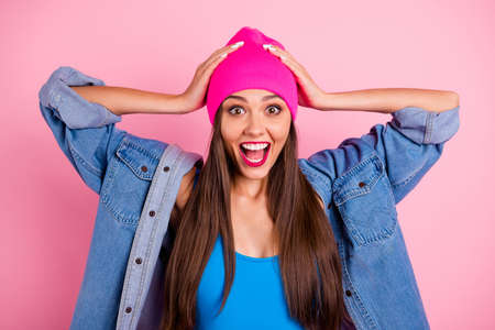 Close-up portrait of her she nice-looking attractive lovely glamorous cheerful cheery excited straight-haired girl great success reaction isolated over pink pastel backgroundの写真素材