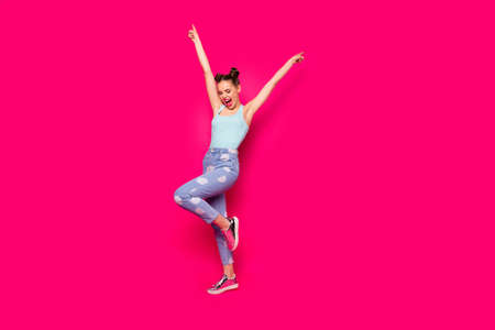 Full length photo of pretty teen shouting closing eyes isolated over fuchsia background
