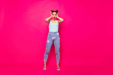 Full size photo of funny youth touching her face shouting unbelievable isolated over fuchsia...
