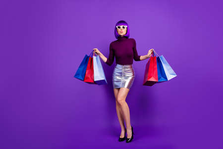 Photo of beautiful stylish lady holding, many packs in hands send air kiss wear trendy outfit...