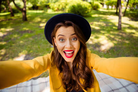 Self-portrait of her she nice-looking attractive lovely charming winsome pretty trendy cheerful cheery wavy-haired girl spending autumn fall season picnic on fresh air outdoorsの写真素材