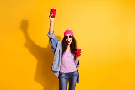 Little party never killed nobody. Photo of stylish lady raising red cups with beer wear casual...