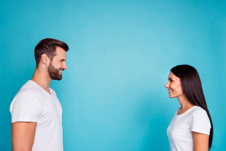 Photo of nice pair look eyes glad finally meeting wear casual outfit, isolated blue background
