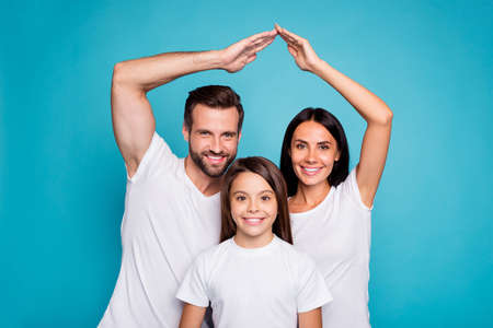 Daddy mommy and little lady under protection on arms roof wear casual outfit isolated blue...