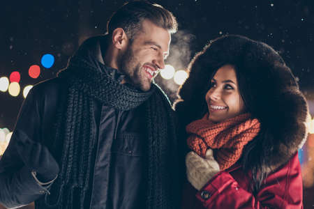 Photo of two affectionate people spend x-mas eve near central park, newyear tree enjoy frosty...