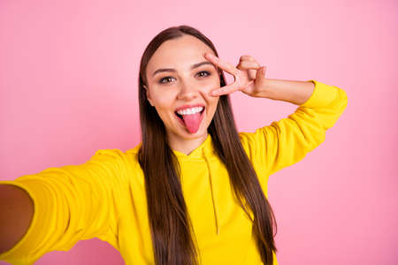Self photo of charming attractive pretty sweet lovely girlfriend taking selfie fooling showing her...