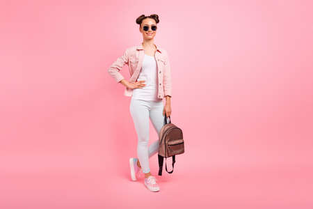 Full length body size view portrait of her she nice-looking attractive, lovely winsome content cheerful cheery girl wearing vintage seasonal springtime apparel posing isolated on pink pastel backgroundの写真素材