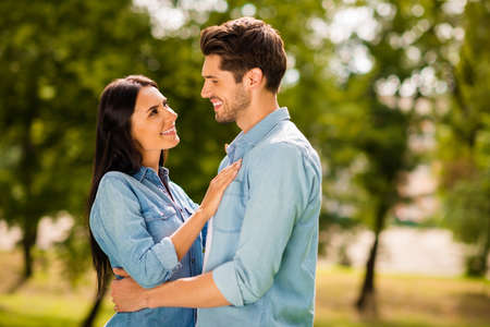 Profile photo of pair enjoy sunny day and park look eyes wear casual denim outfit