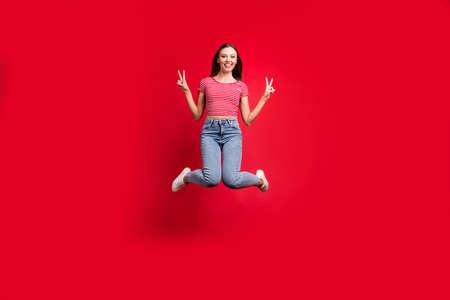 Full length body size photo of charming cute beautiful pretty girlfriend wearing jeans denim jumping...