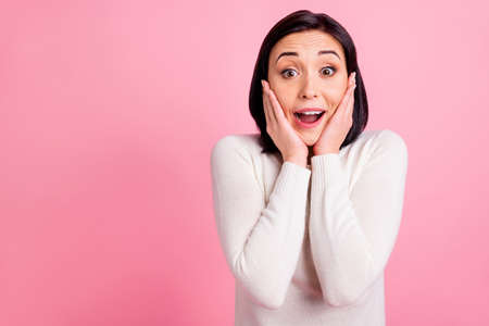 Photo of funny business lady raising arms to cheeks celebrating black friday prices coming wear...