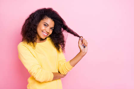 Portrait of charming positive african girl touch her hair enjoy new anti dander, dandruff...