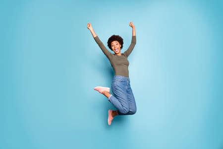 Full body photo of excited dark skin lady jumping high rejoicing with student, low cost trip abroad...
