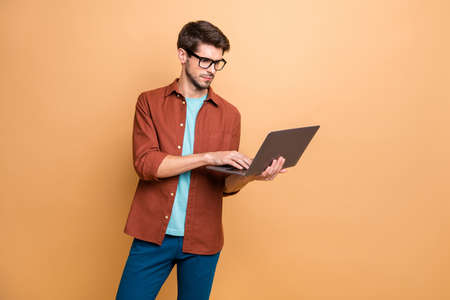 Portrait of his he nice attractive serious successful smart clever focused concentrated brunette guy...