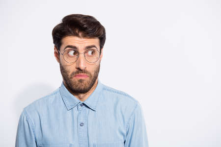 Photo of amazing indian guy looking side empty space feel guilty for awful situation wear specs...