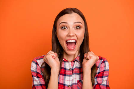 Hot discounts black friday concept. Close up photo portrait of pretty funny funky teen fan looking at pop start she adores isolated bright color backgroundの写真素材