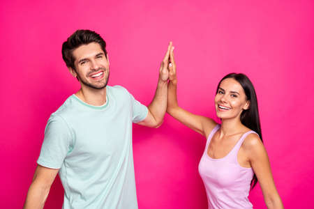 Profile photo of funny guy and lady couple did good job clapping hands rejoicing, after best team...