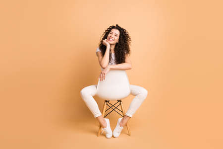Full size photo of amazing lady sitting comfy chair between legs good mood inspired to begin working...