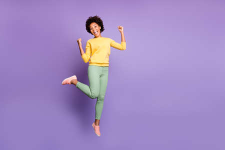 Full length photo of excited afro american girl hear news lucky autumn fall victory impressed scream...