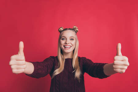 Photo of amazing pretty lady raising thumbs up approving best quality of product wearing knitted...