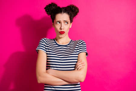 Photo of disappointed cute nice sweet pretty girl with arms crossed about to cry offended looking...