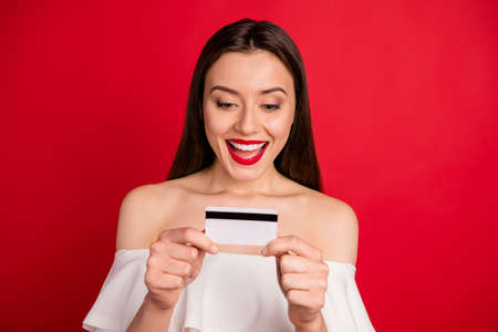 Close up photo of pretty youth holding, plastic card screaming shouting dressed off-shoulders...
