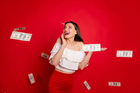 Portrait of cute youth impressed touch face with hand wear red skirt isolated over red background