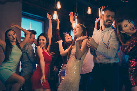 Low below angle view photo of cheerful positive beautiful company dressed in formalwear decided to...