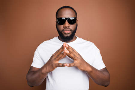 Close-up portrait of his he nice attractive content serious bearded guy wearing white tshirt folded...