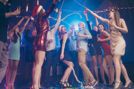 Crazy crowd gathering at home concept. Low below view photo of excited cheerful screaming having fun congrats students buddies enjoying good mood best event positive newyearの写真素材