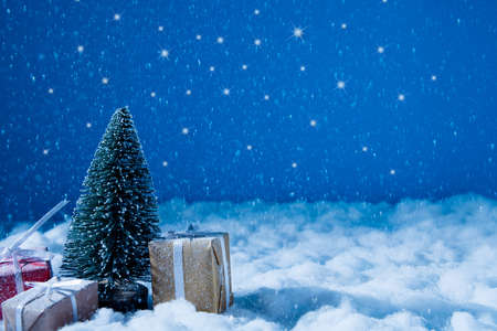 Photo of christmas festive greeting, banner small miniature idea brochure snowy road big giftboxes...