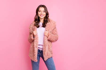 Photo of amazing millennial model lady standing confidently posing for magazine portrait wearing...