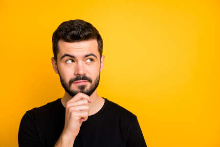 Close up photo of focused minded guy think thoughts black friday touch chin hands look copyspace...