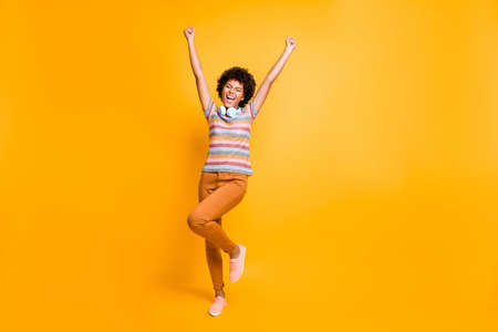 Full size photo of ecstatic crazy afro american girl have headset found favorite song radio listen...