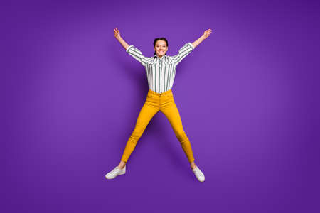 Full length body size view of her she nice attractive cheerful cheery funky girl jumping up having...