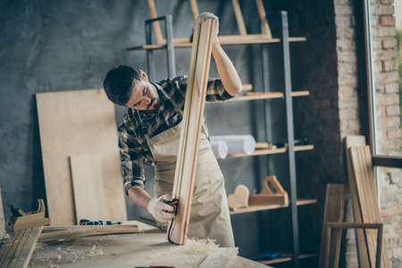 Portrait of his he nice attractive focused concentrated professional experienced guy expert carving...