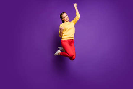 Goal. Full length photo of teen lady jumping high celebrating best win of football team wear casual...