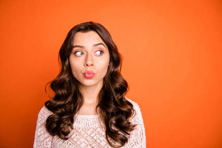 Portrait of funny funky pretty girl look copy space watch boyfriends want send air kiss on holidays...