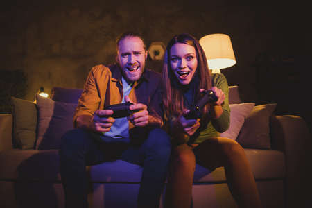 Portrait of his he her she nice attractive lovely glad cheerful cheery brother sister sitting on...