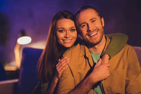 Close-up portrait of his he her she nice attractive lovely cheerful cheery sweet spouses sitting on...