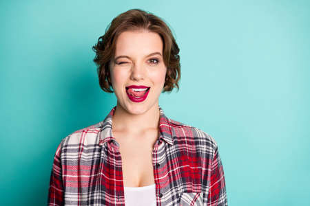 Close up photo of fooling lovely youth girl wink blink lick lips enjoy summer free time wear stylish...