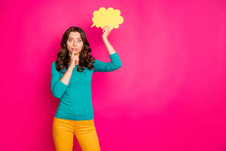 Copyspace photo of trendy curly wavy girlfriend showing you shh sign to stop discussing ger thoughts...