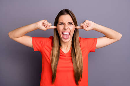 Portrait of outraged girl have scandal with boyfriend dont want listen offense cover close ears...