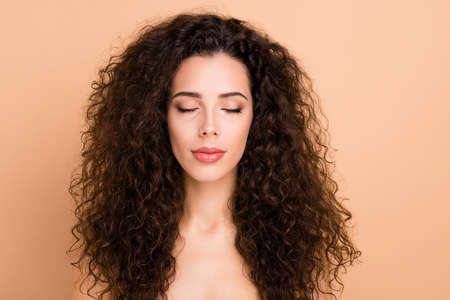 Close up photo beautiful amazing she her model lady eyes closed healthy brunette curls hairdo ideal...