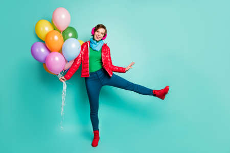 Full size photo of funny energetic lady bring many colorful air balloons to students party wear...
