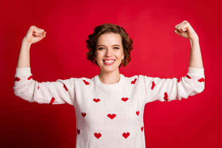 Close-up portrait of her she nice attractive cheerful cheery brown-haired girl showing strong...
