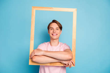 Portrait of content guy hold wooden brick frame make picture of himself wear good looking outfit...