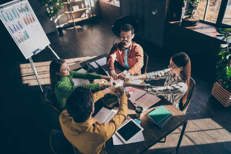 Top above high angle view photo of united smart team of developers building friendly relations inside the colleagues increasing their economical knowledgeの写真素材
