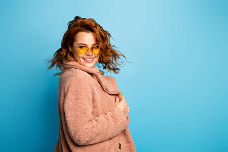 Turned photo of candid cute pretty sweet woman enjoy winter weather holiday touch beige outerwear...