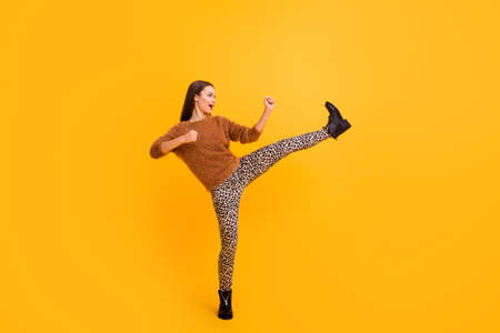 Full length profile photo of funky lady good mood youth look attend self defense courses training...